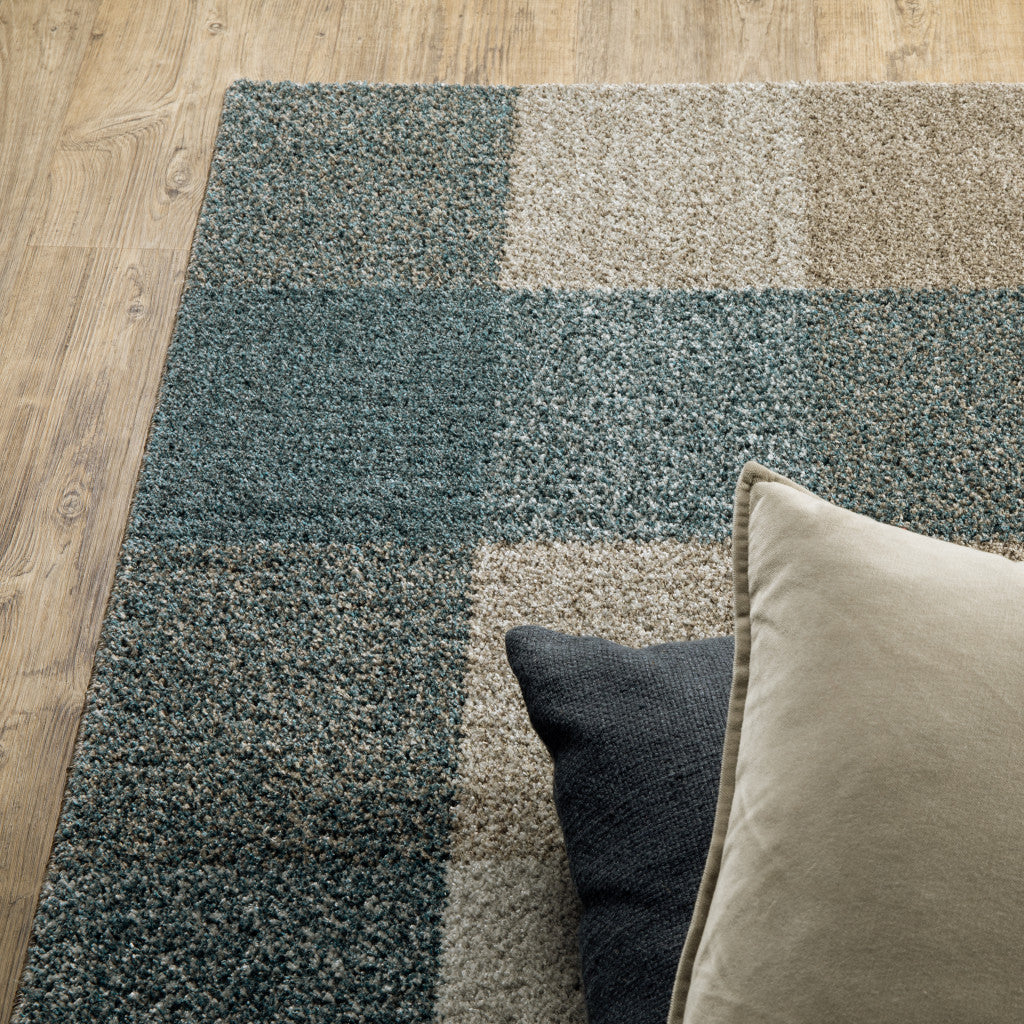 6' X 9' Teal Grey Tan And Beige Geometric Power Loom Stain Resistant Area Rug