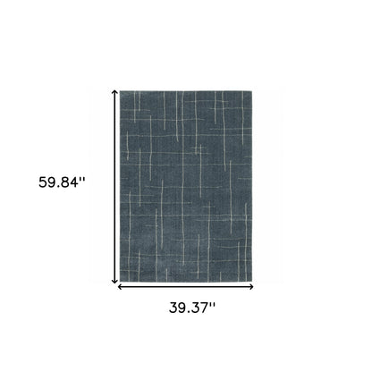 3' X 5' Blue And Grey Geometric Power Loom Stain Resistant Area Rug