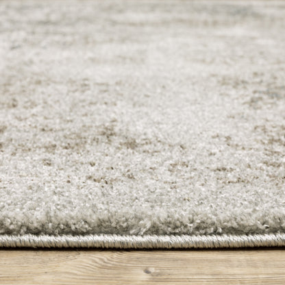 8' X 11' Grey Beige And Teal Oriental Power Loom Stain Resistant Area Rug