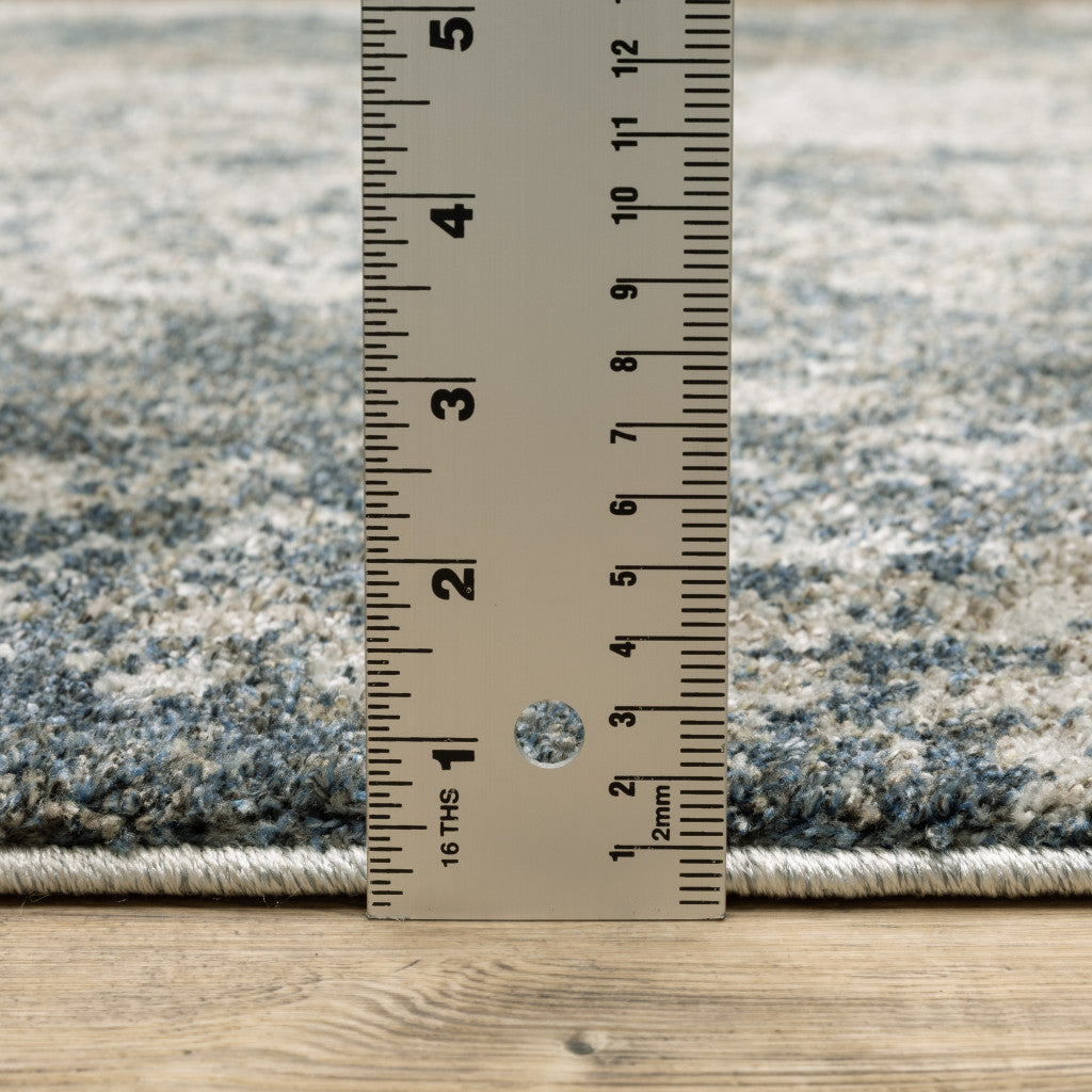 6' X 9' Teal Grey Tan And Beige Abstract Power Loom Stain Resistant Area Rug