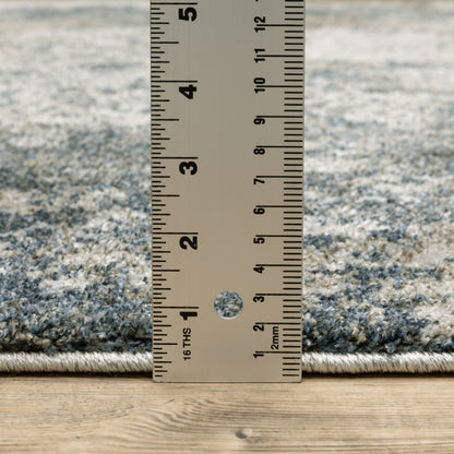 6' X 9' Teal Grey Tan And Beige Abstract Power Loom Stain Resistant Area Rug