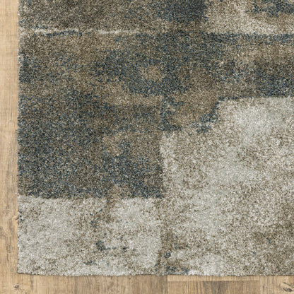 10' X 13' Teal Blue Grey Tan And Beige Geometric Power Loom Stain Resistant Area Rug