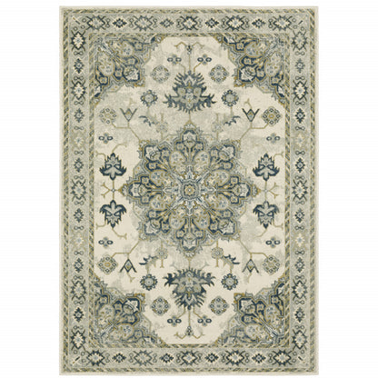 6' X 9' Ivory Blue Teal Grey And Olive Green Oriental Power Loom Stain Resistant Area Rug