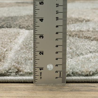 6' X 9' Grey Brown Beige Tan Taupe And Ivory Geometric Power Loom Stain Resistant Area Rug