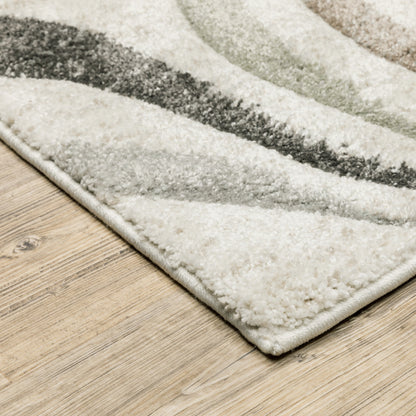 6' X 9' Beige Grey Brown Sage Pale Blue Tan And Charcoal Abstract Power Loom Stain Resistant Area Rug