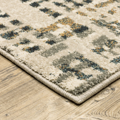 6' X 9' Beige Grey Blues Orange Yellow And Ivory Abstract Power Loom Stain Resistant Area Rug