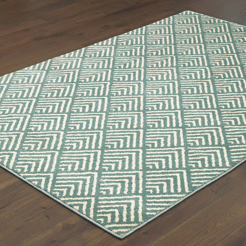 10' X 13' Foam Blue And Ivory Geometric Power Loom Stain Resistant Area Rug