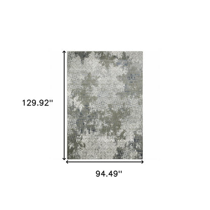 8' X 11' Ivory Grey Blue And Taupe Abstract Power Loom Stain Resistant Area Rug