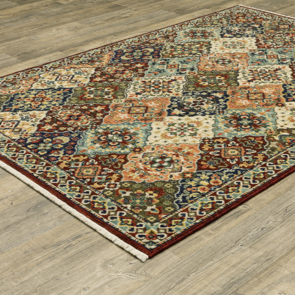 5' X 8' Red Rust Navy Light Blue Brown Orange Ivory And Gold Oriental Power Loom Stain Resistant Area Rug With Fringe