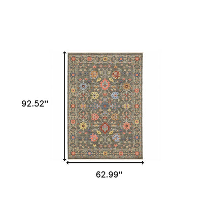 5' X 8' Grey Salmon Pink Gold Blue Rust Deep Blue Ivory And Green Oriental Power Loom Stain Resistant Area Rug With Fringe