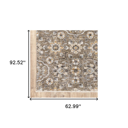 5' X 8' Grey And Tan Floral Power Loom Stain Resistant Area Rug With Fringe