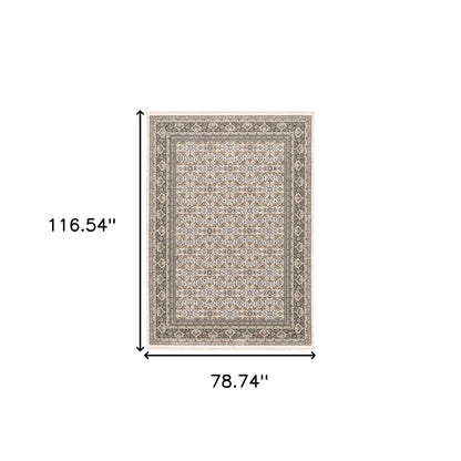 6' X 9' Ivory And Grey Oriental Power Loom Stain Resistant Area Rug With Fringe