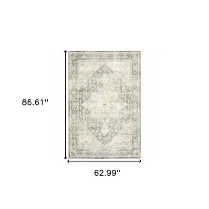 5' X 7' Grey Ivory And Blue Oriental Power Loom Stain Resistant Area Rug