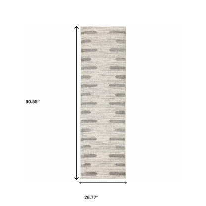 2' X 8' Ivory And Grey Geometric Shag Power Loom Stain Resistant Runner Rug
