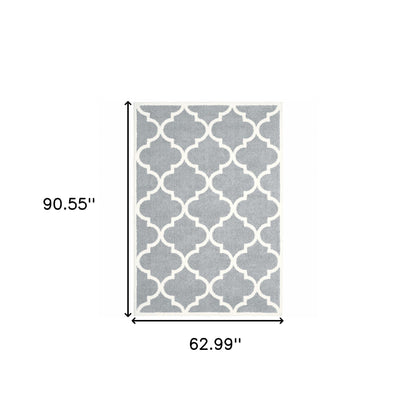 5' X 8' Grey And Ivory Geometric Shag Power Loom Stain Resistant Area Rug