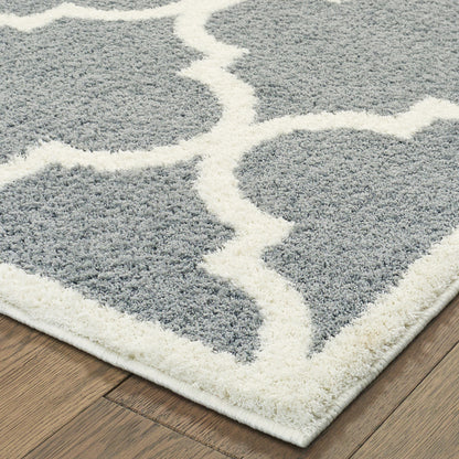 6' X 9' Grey And Ivory Geometric Shag Power Loom Stain Resistant Area Rug
