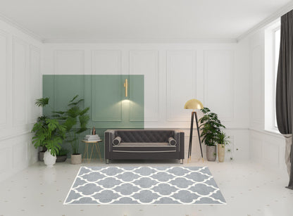 6' X 9' Grey And Ivory Geometric Shag Power Loom Stain Resistant Area Rug