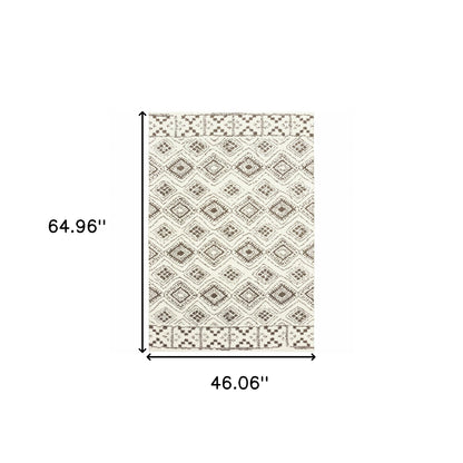 4' X 6' Ivory And Brown Geometric Shag Power Loom Stain Resistant Area Rug