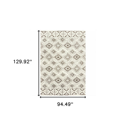 8' X 11' Ivory And Brown Geometric Shag Power Loom Stain Resistant Area Rug