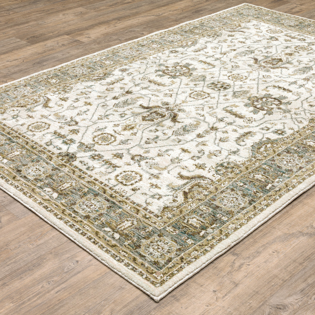 6' X 9' Ivory Grey And Blue Oriental Power Loom Stain Resistant Area Rug