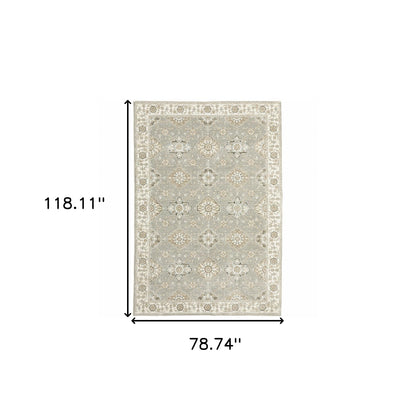 6' X 9' Grey Ivory Tan Brown And Gold Oriental Power Loom Stain Resistant Area Rug