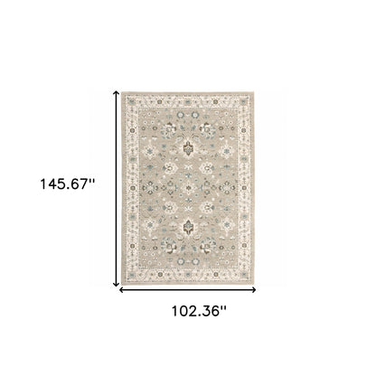 9' X 12' Beige Ivory Blue Green And Purple Oriental Power Loom Stain Resistant Area Rug