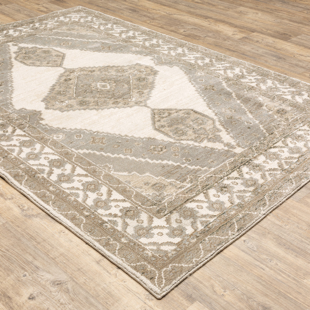 2' X 3' Beige And Ivory Oriental Power Loom Stain Resistant Area Rug