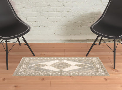 2' X 3' Beige And Ivory Oriental Power Loom Stain Resistant Area Rug