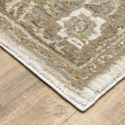 6' X 9' Beige Ivory Tan Gold Grey And Green Oriental Power Loom Stain Resistant Area Rug