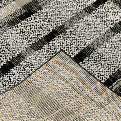 10' X 13' Black Grey And Ivory Geometric Power Loom Stain Resistant Area Rug