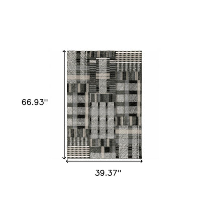 3' X 5' Black Grey And Ivory Geometric Power Loom Stain Resistant Area Rug