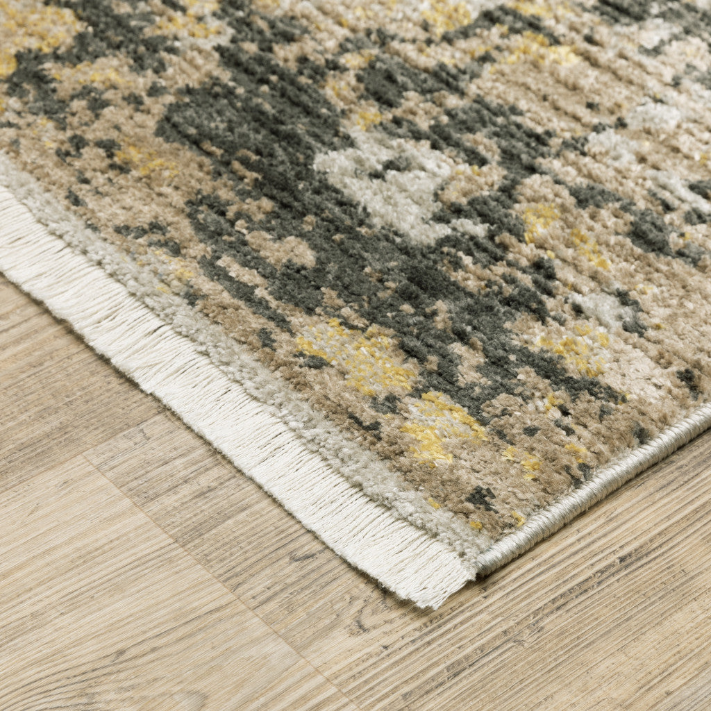 6' X 9' Grey Gold Black Charcoal And Beige Abstract Power Loom Stain Resistant Area Rug With Fringe