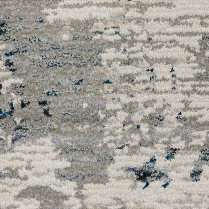 10' X 13' Blue Beige And Teal Abstract Power Loom Stain Resistant Area Rug