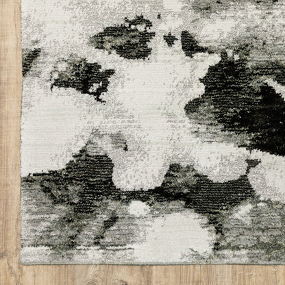 2' X 10' Charcoal And White Abstract Power Loom Stain Resistant Runner Rug