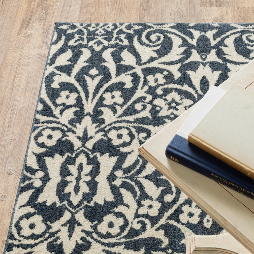 2' X 8' Blue And Ivory Floral Power Loom Stain Resistant Runner Rug