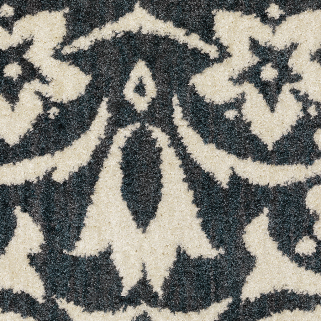 2' X 8' Blue And Ivory Floral Power Loom Stain Resistant Runner Rug