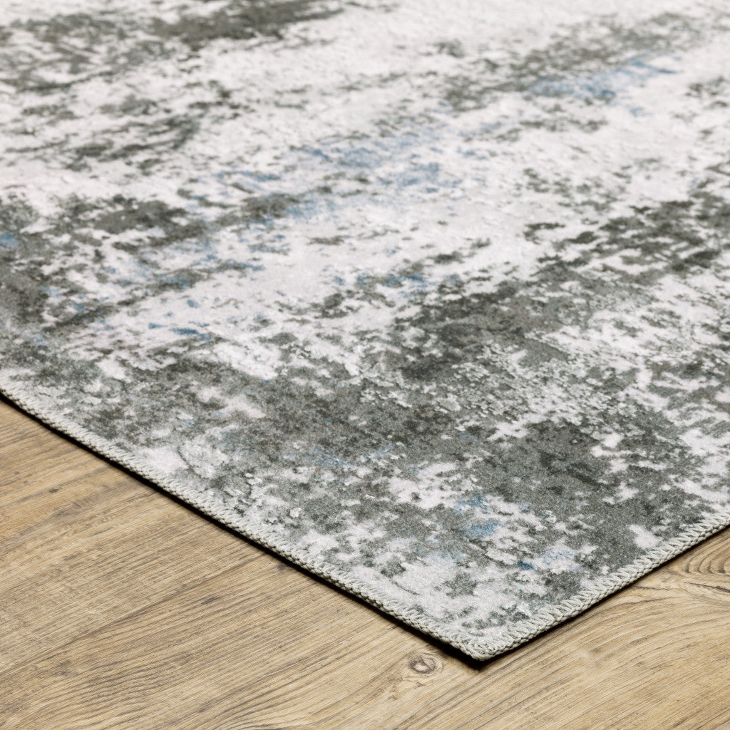 5' X 7' Silver Grey Charcoal And Light Blue Abstract Printed Stain Resistant Non Skid Area Rug