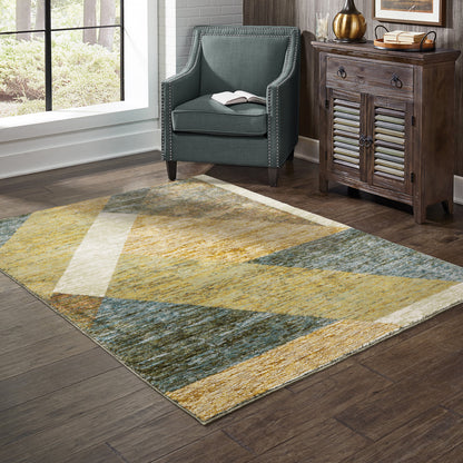 5' X 7' Gold Blue Green Rust Beige Purple And Teal Geometric Power Loom Stain Resistant Area Rug
