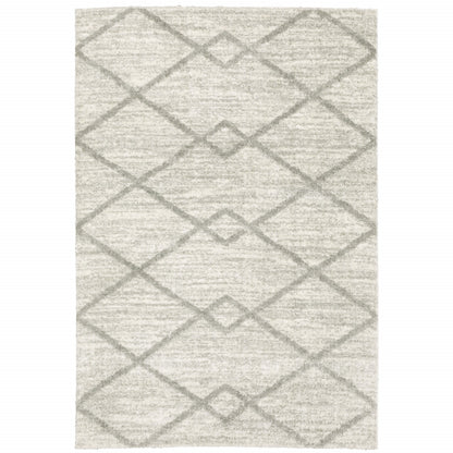 8' X 11' Ivory And Grey Geometric Shag Power Loom Stain Resistant Area Rug
