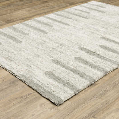 8' X 11' Ivory And Grey Geometric Shag Power Loom Stain Resistant Area Rug