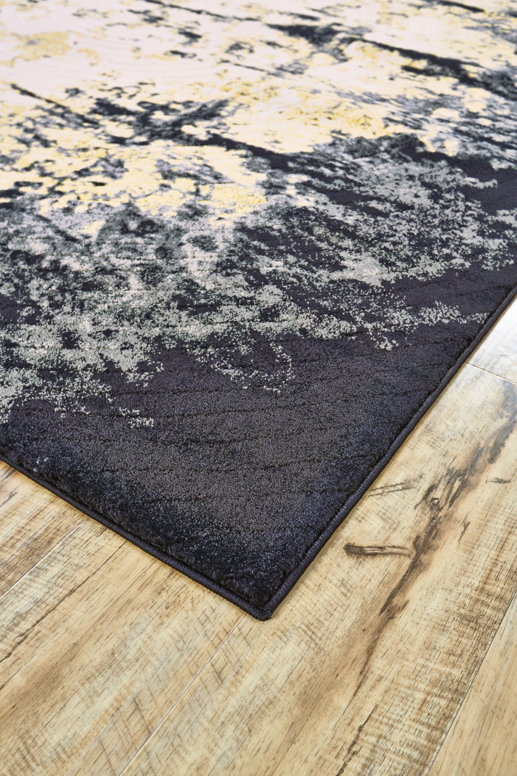 4' X 6' Black Gray And Gold Geometric Stain Resistant Area Rug