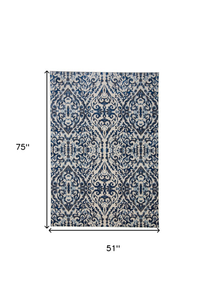 2' X 4' Blue Ivory And Black Floral Distressed Stain Resistant Area Rug