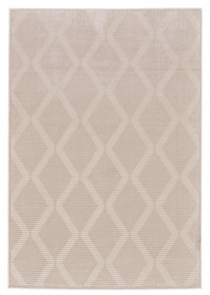 5' X 8' Ivory And Tan Geometric Stain Resistant Area Rug