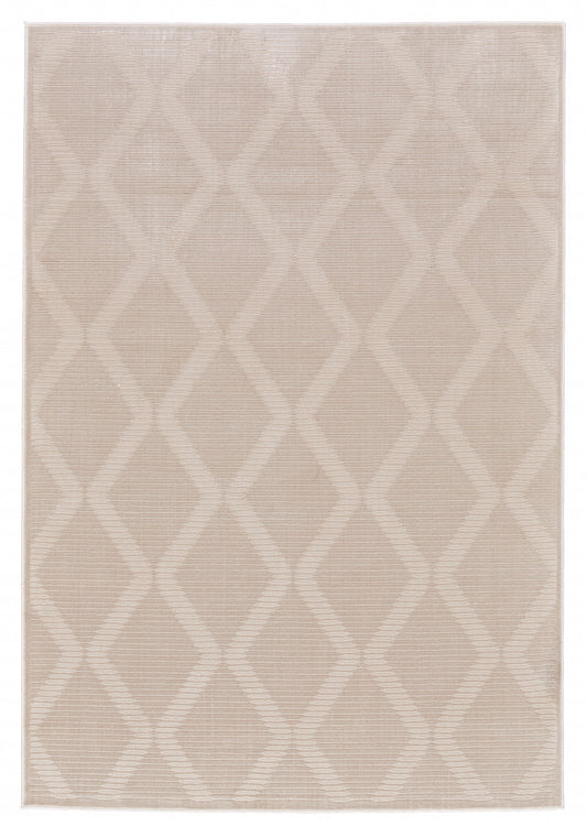 5' X 8' Ivory And Tan Geometric Stain Resistant Area Rug