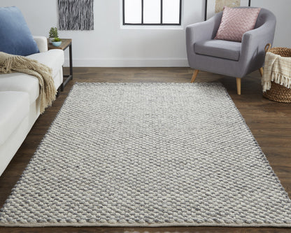 4' X 6' Gray And Ivory Wool Floral Hand Woven Stain Resistant Area Rug