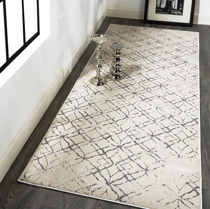 5' X 8' Silver Gray And White Abstract Stain Resistant Area Rug