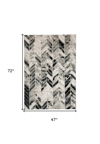 8' X 11' Black Gray And Silver Geometric Stain Resistant Area Rug