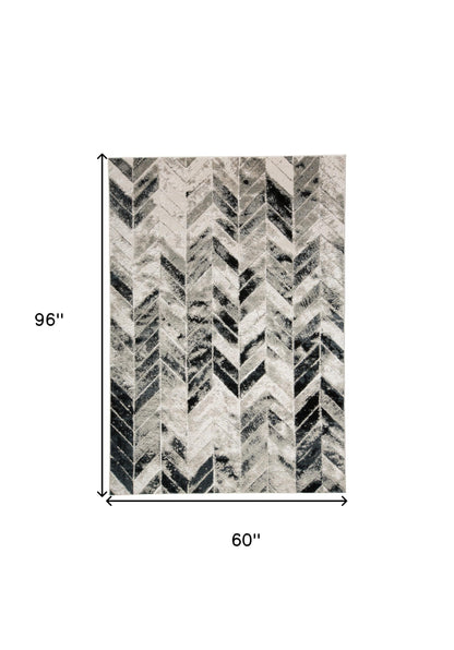 8' X 11' Black Gray And Silver Geometric Stain Resistant Area Rug