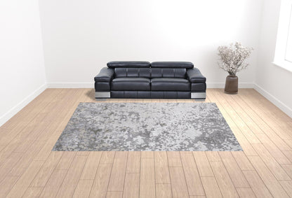 8' X 11' Silver Gray And White Abstract Stain Resistant Area Rug