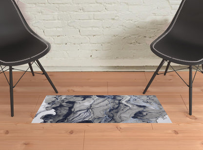 5' X 7' Blue Gray And Ivory Abstract Power Loom Stain Resistant Area Rug